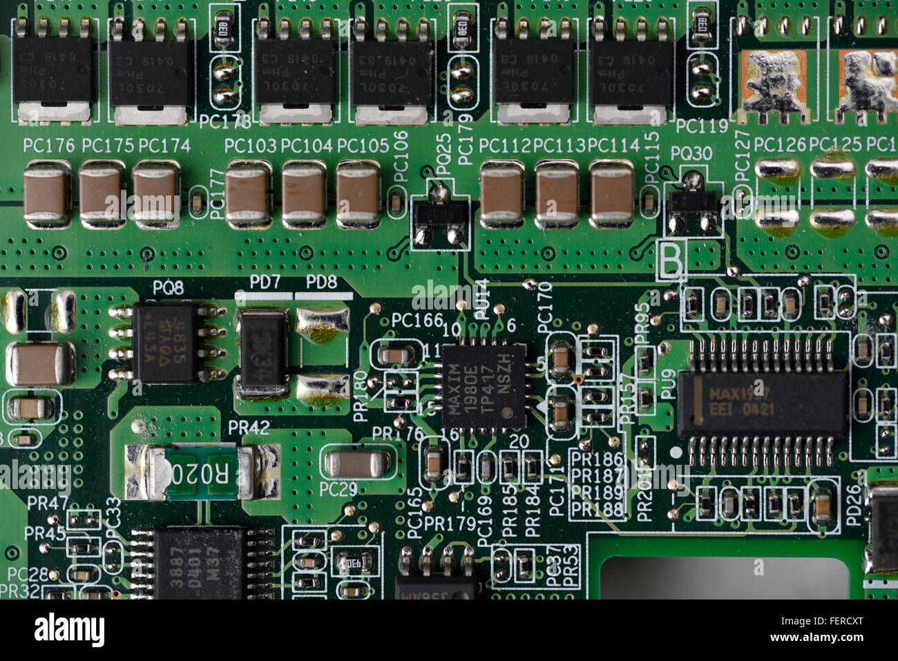 Electronic components from a laptop integrated circuit board Stock Photo