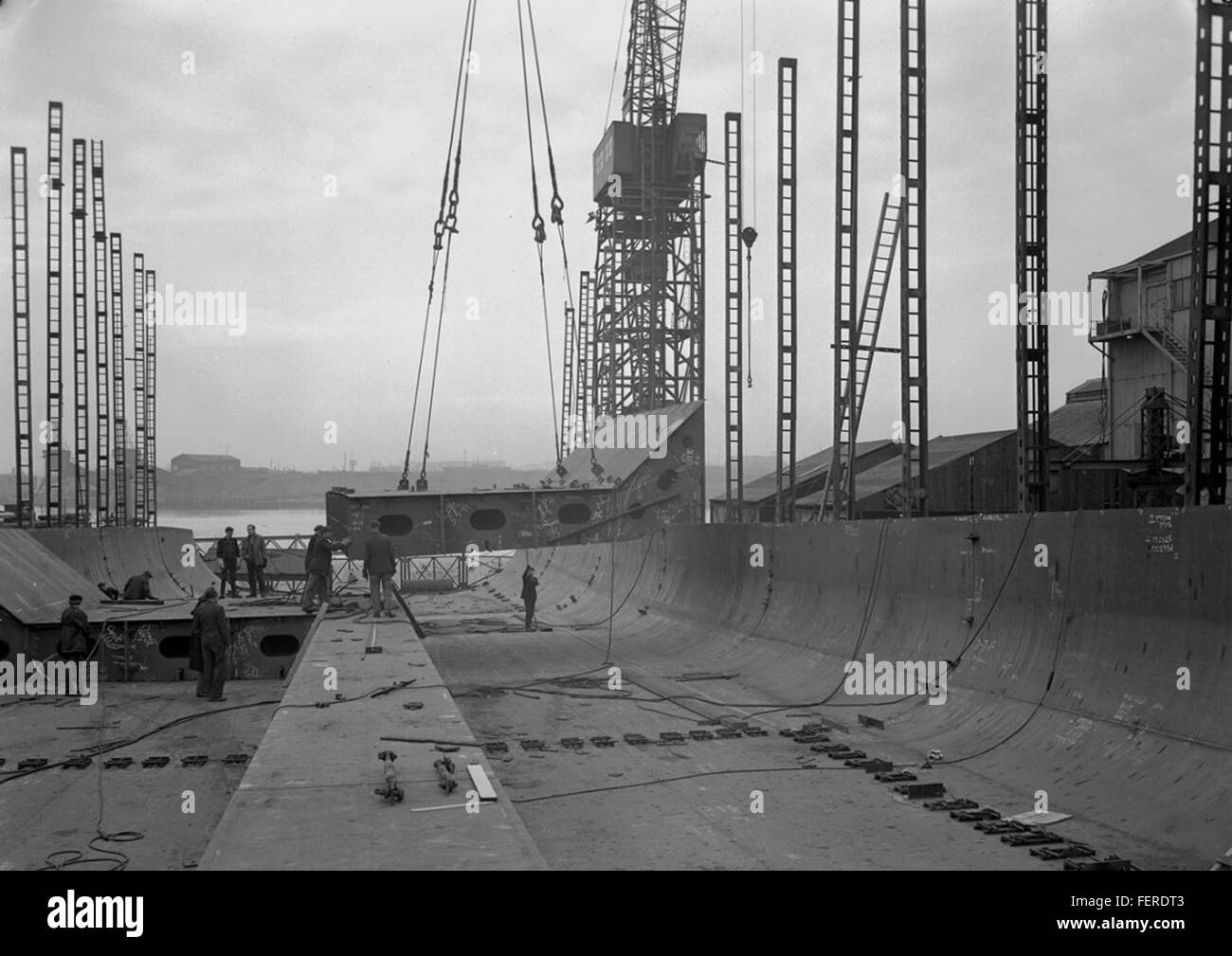 Manoeuvring prefabricated sections at Readhead's shipyard Manoeuvring prefabricated sections at Readhead's shipyard Stock Photo