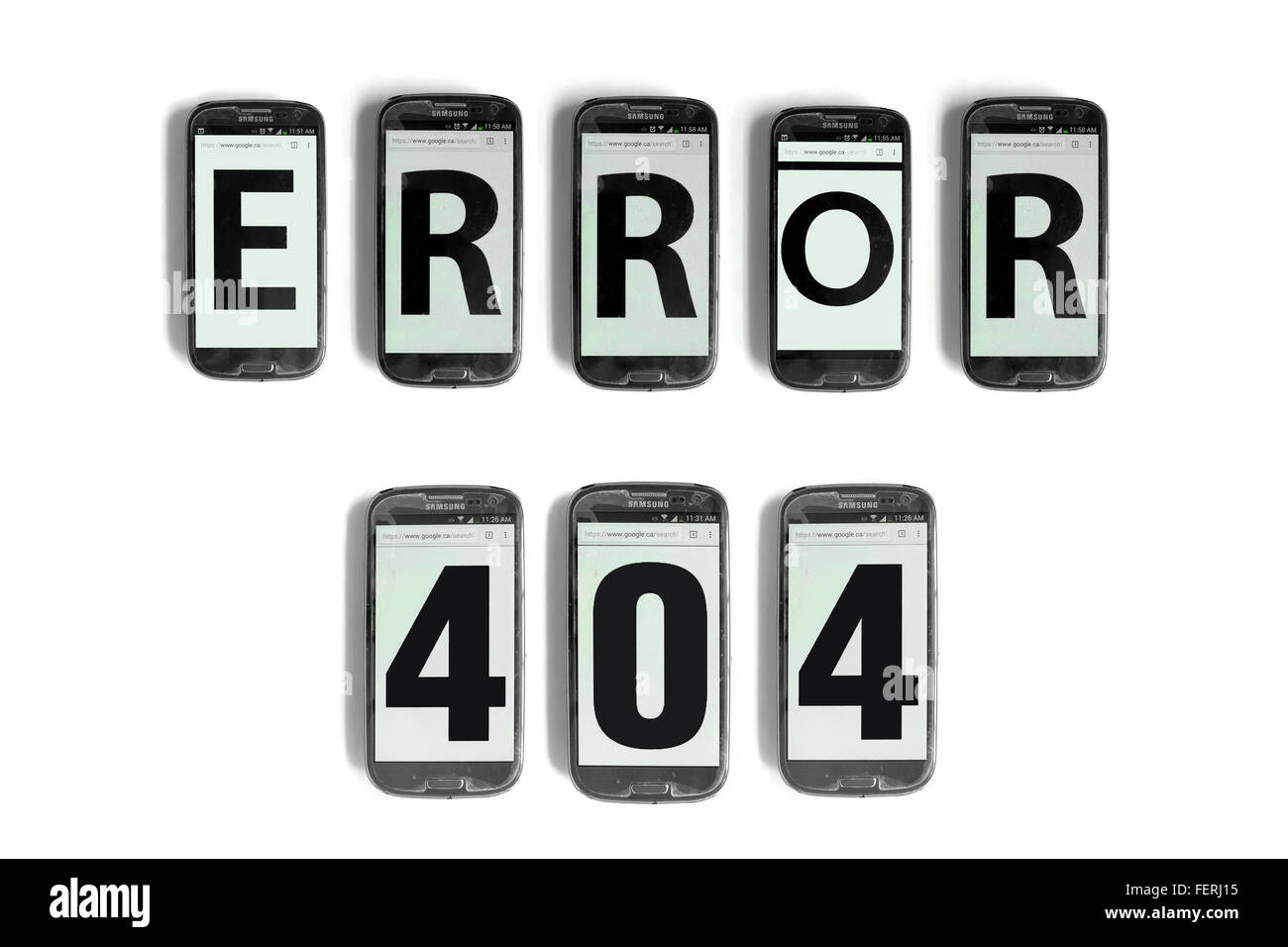 Error 404 on the screens of smartphones photographed against a white background. Stock Photo