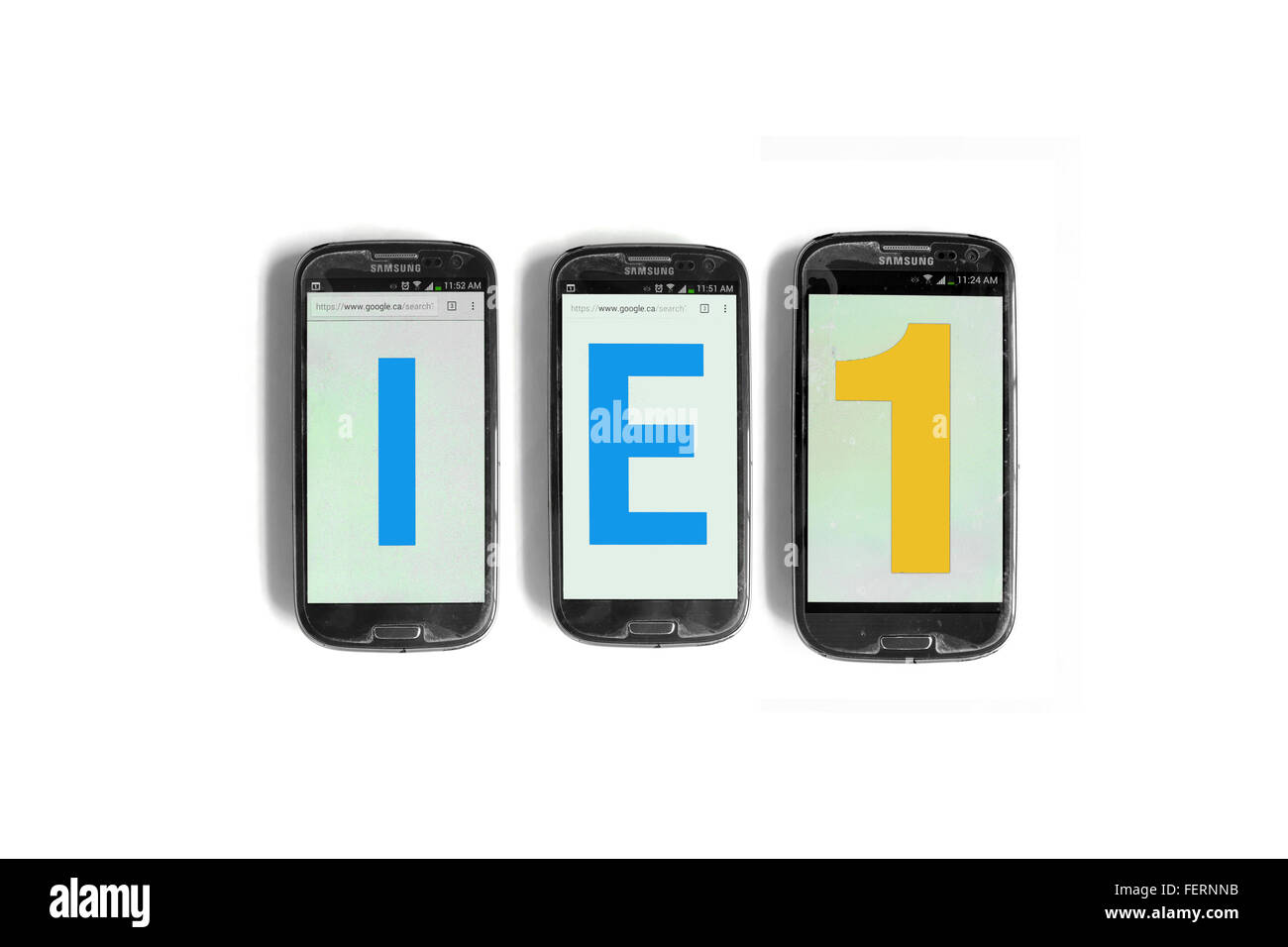 IE1 on the screens of smartphones photographed against a  white background. Stock Photo
