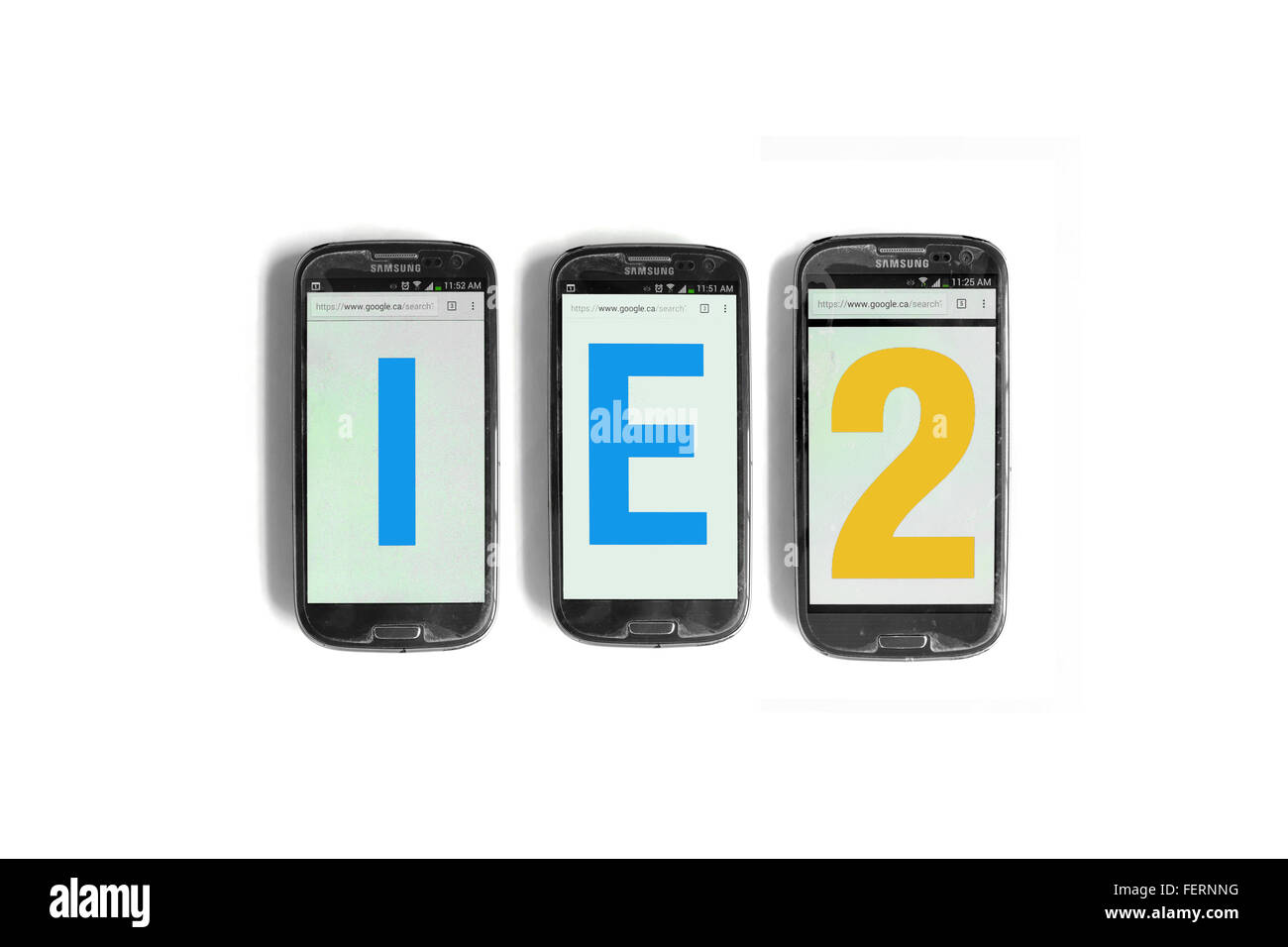 IE2 on the screens of smartphones photographed against a  white background. Stock Photo