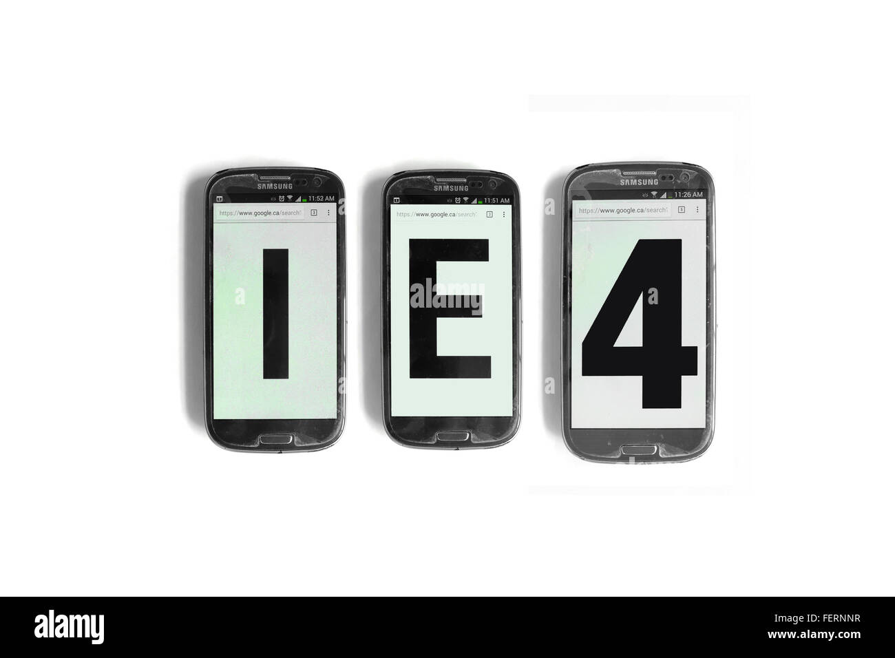 IE4 on the screens of smartphones photographed against a  white background. Stock Photo