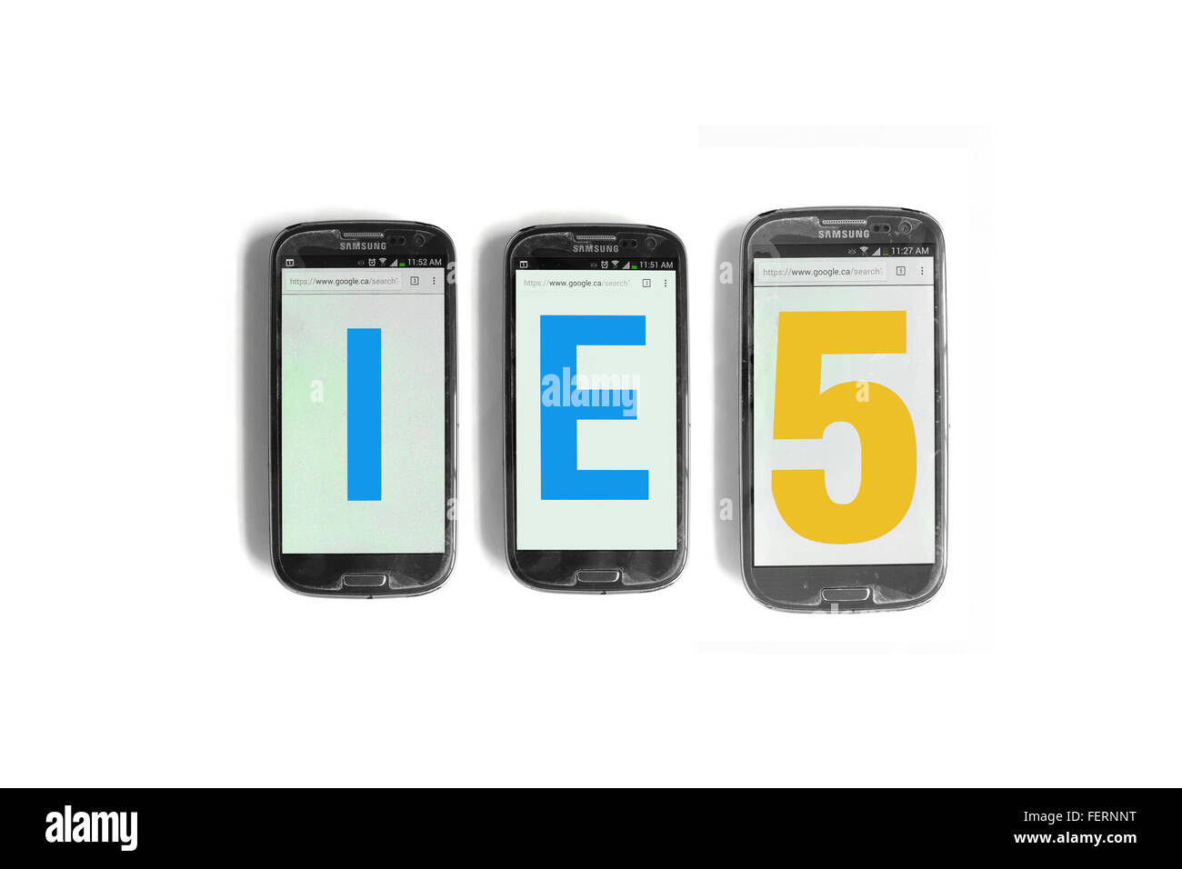 IE5 on the screens of smartphones photographed against a  white background. Stock Photo