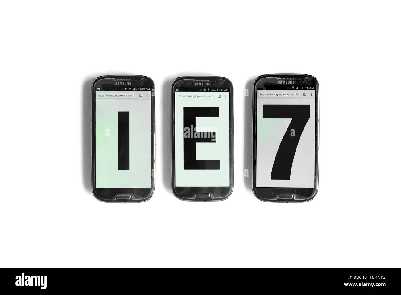 IE7 on the screens of smartphones photographed against a  white background. Stock Photo