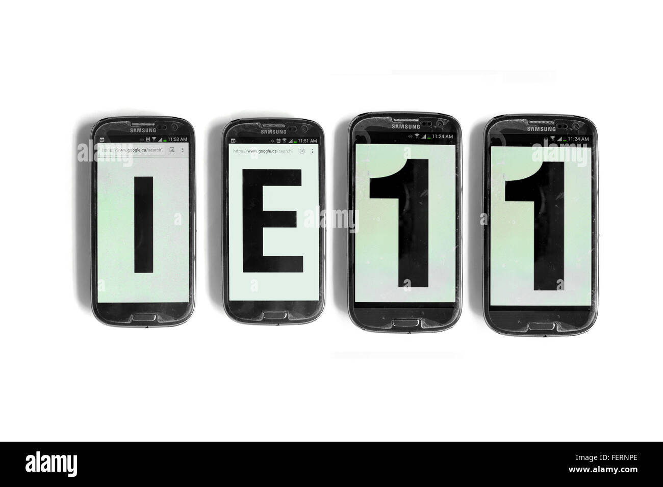 IE11 on the screens of smartphones photographed against a white background. Stock Photo