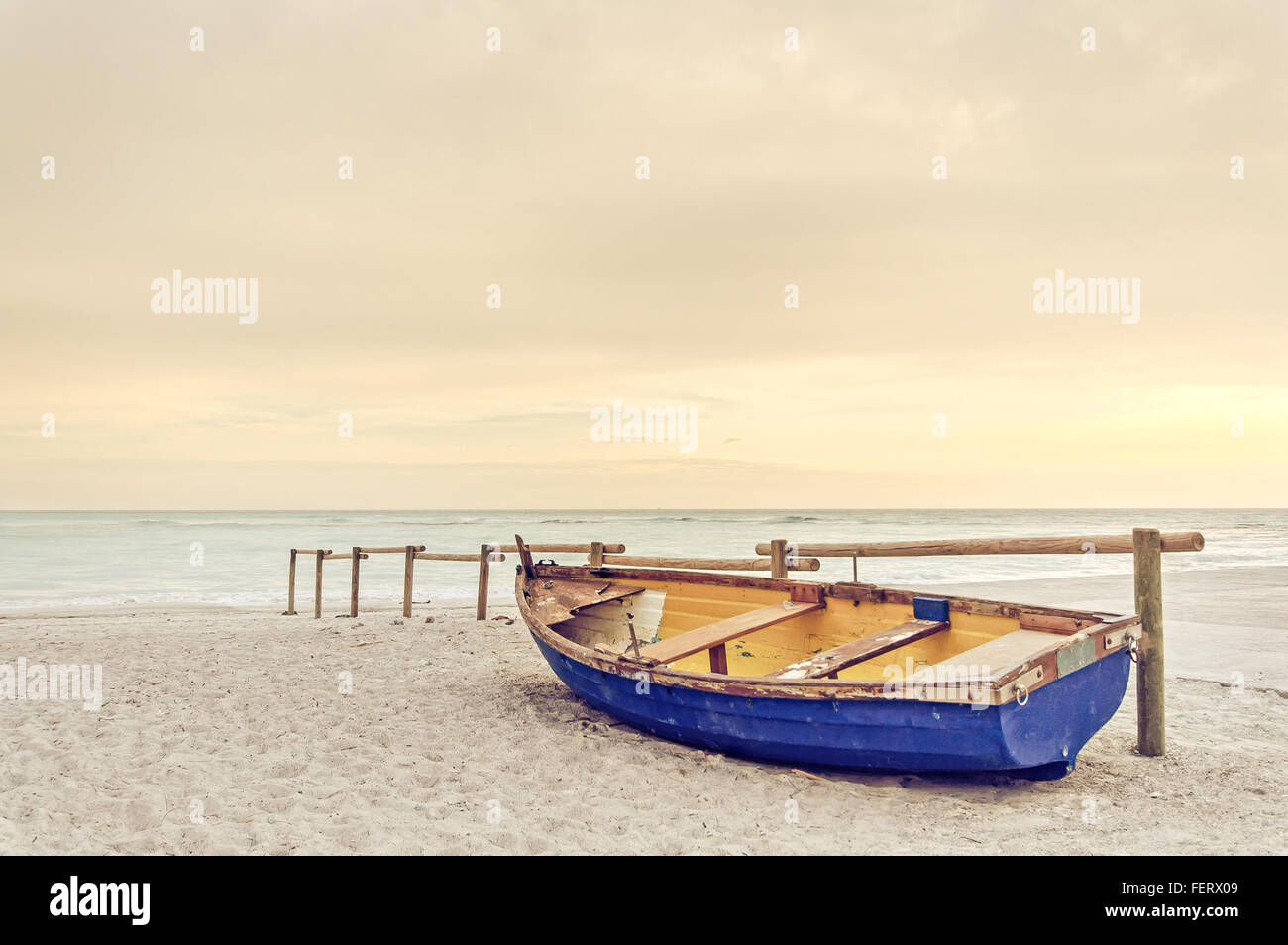 Beach boat sunset hi-res stock photography and images - Alamy