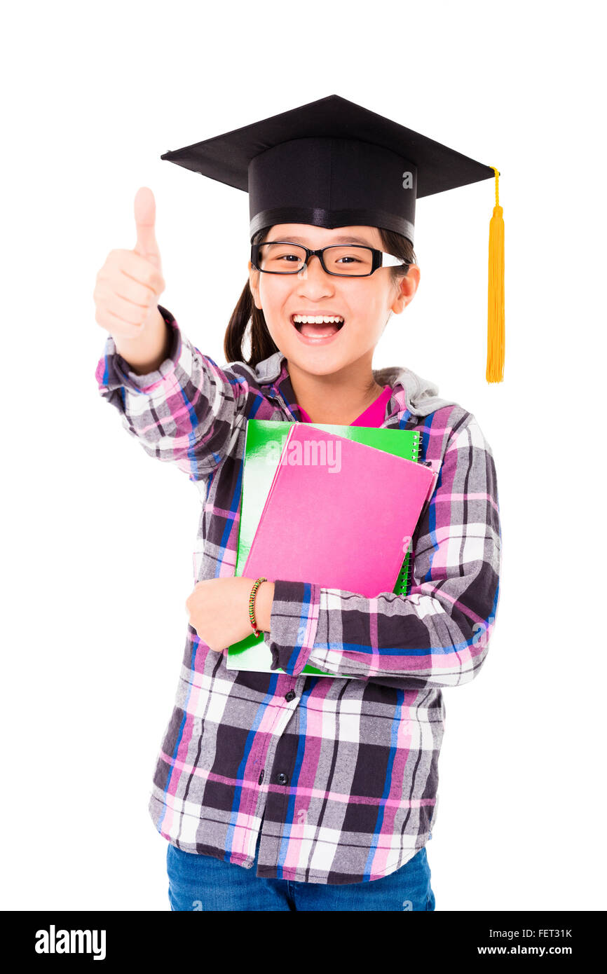 happy school kid in graduation cap with thumb up Stock Photo