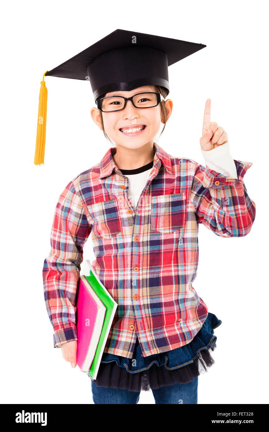 happy school kid in graduation cap with success gesture Stock Photo