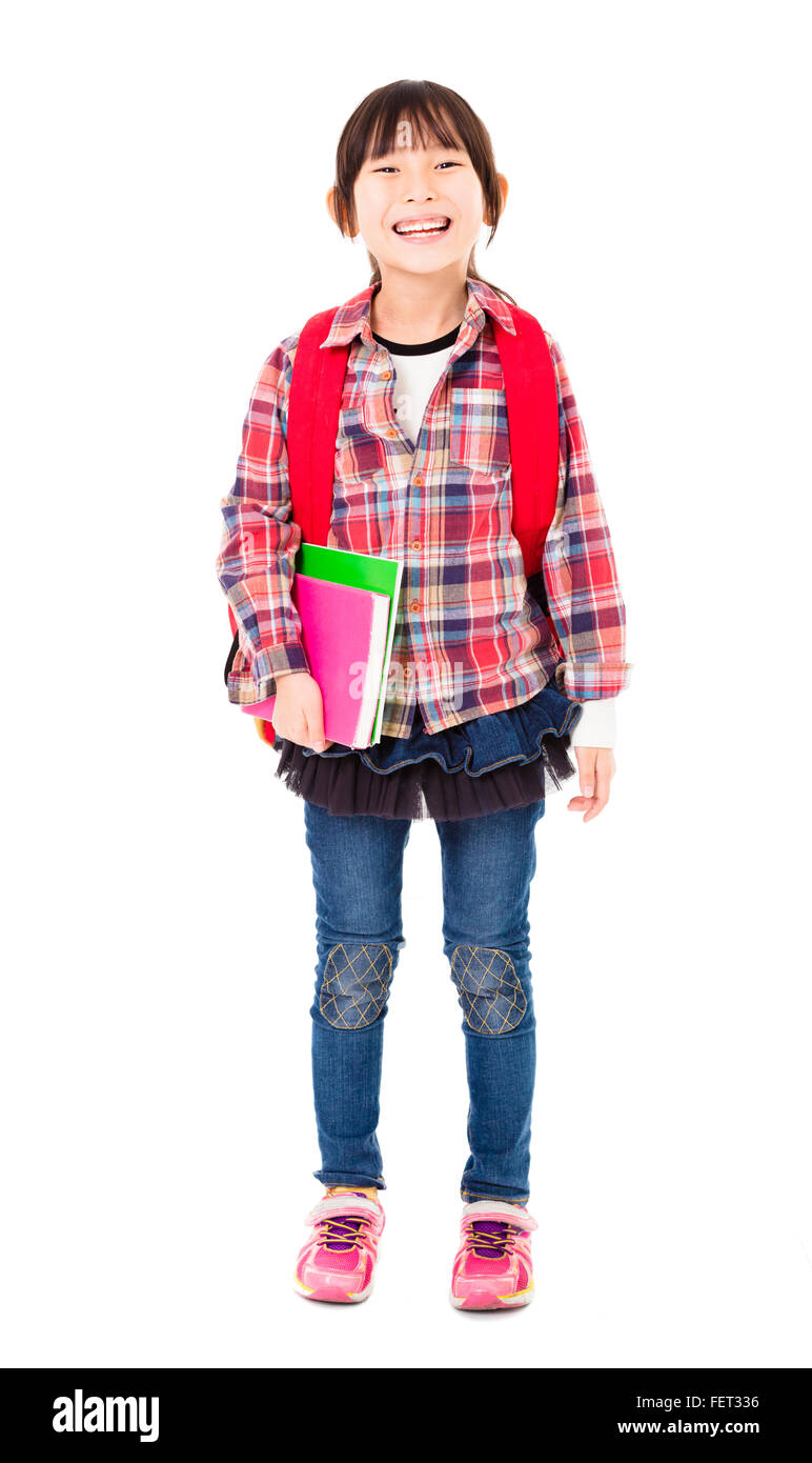 full length of happy little girl holding books Stock Photo - Alamy