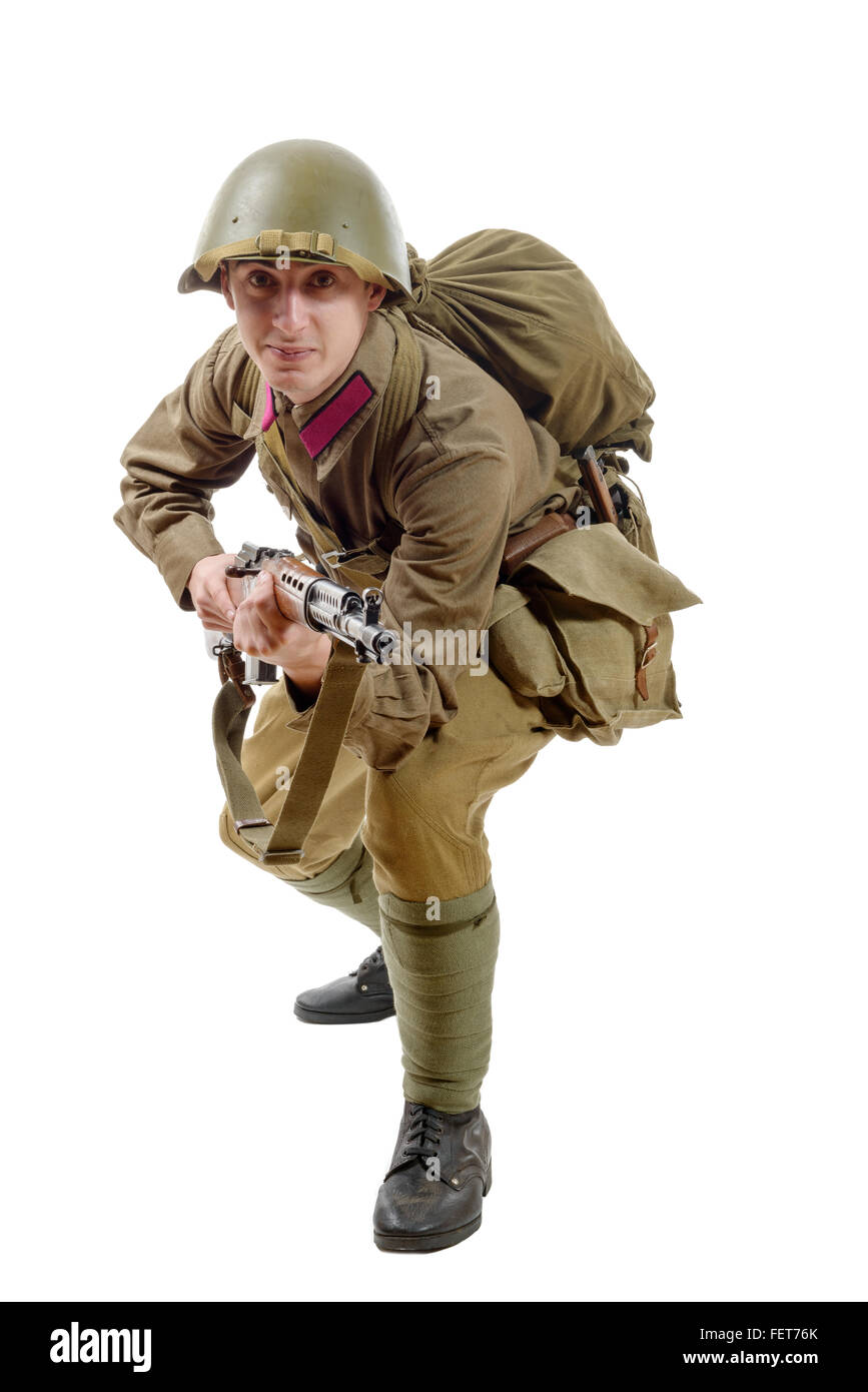 young Soviet soldier with SVT rifle on the white background Stock Photo