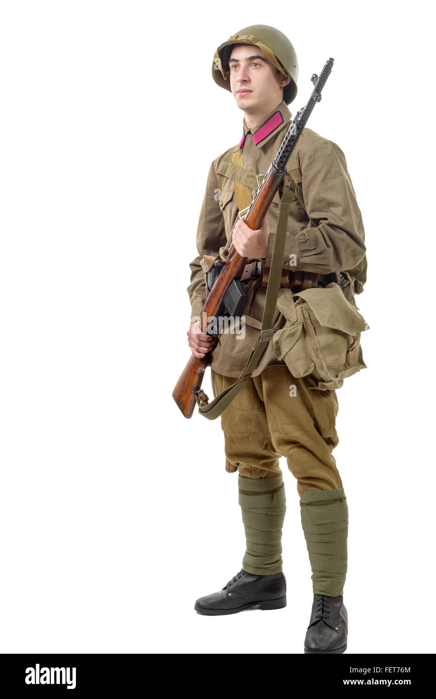 a young Soviet soldier with rifle on the white background Stock Photo ...