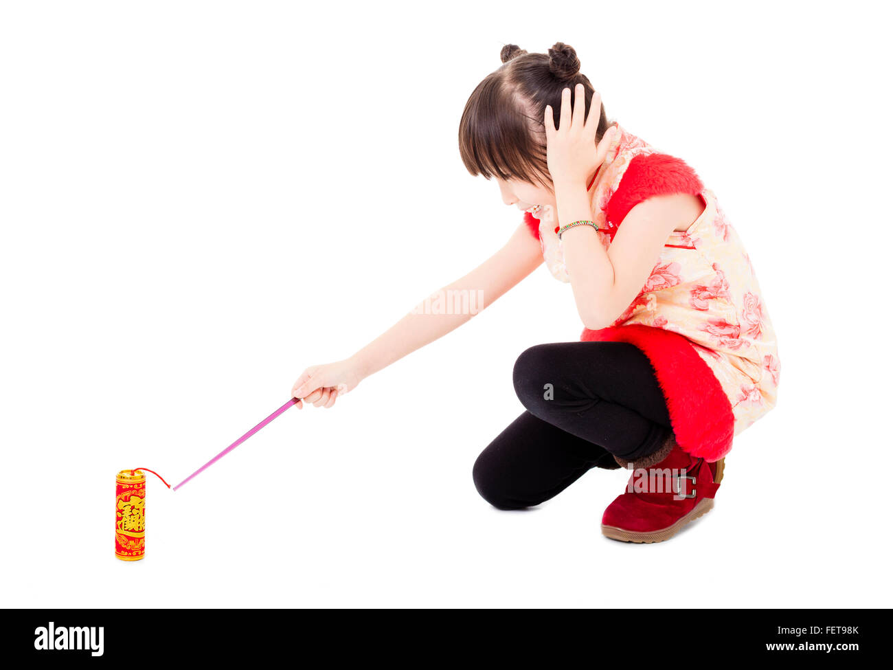 happy chinese new year. kids playing with firecracker Stock Photo