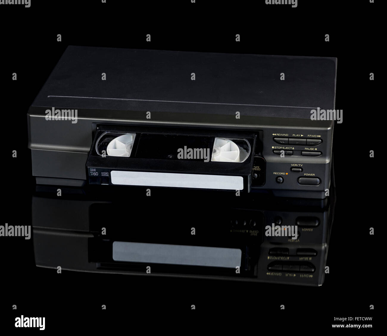 Old technology VCR tape and player Stock Photo Alamy