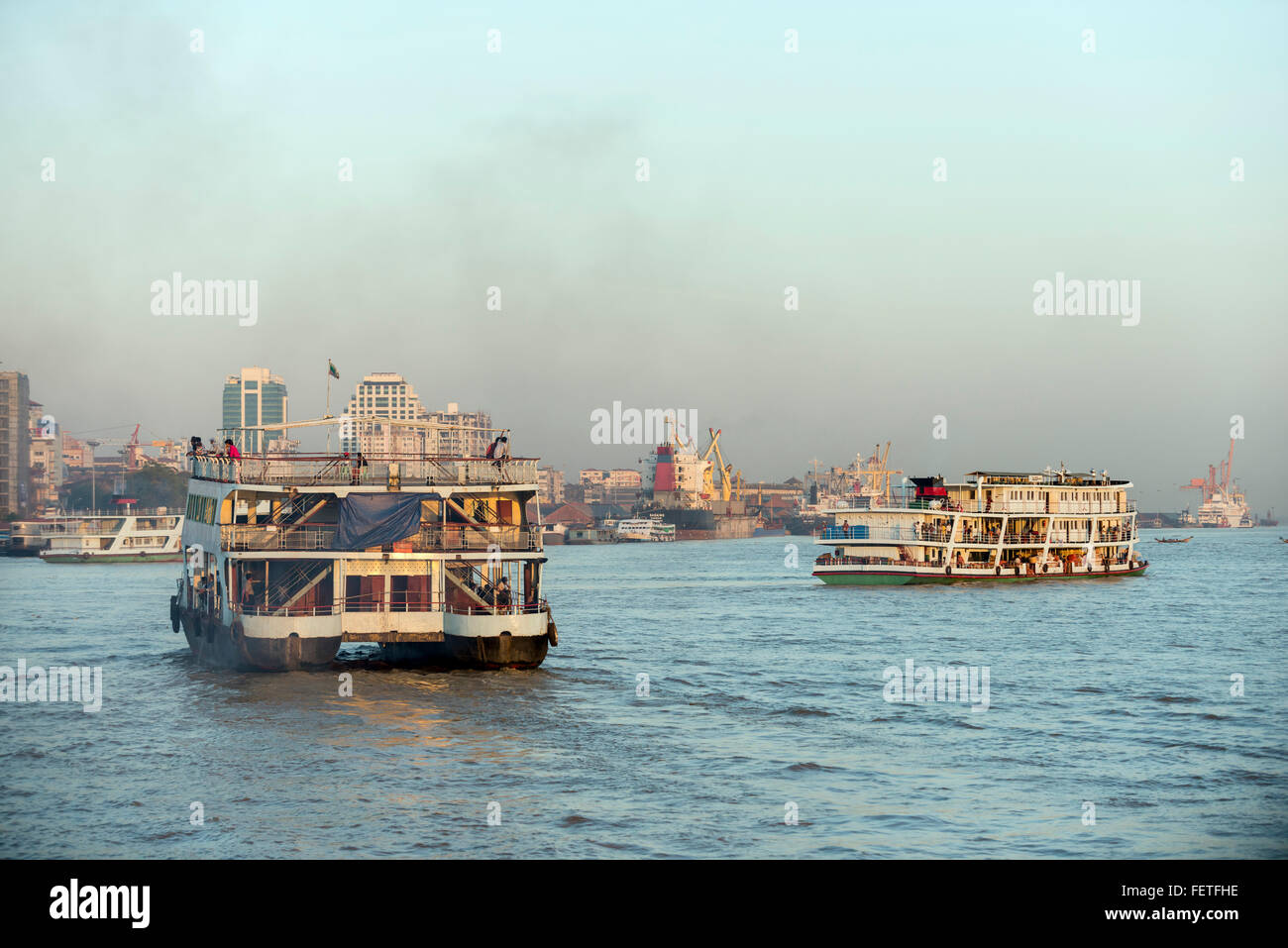Passenger boats on the Irrawaddy river, Burma Stock Photo