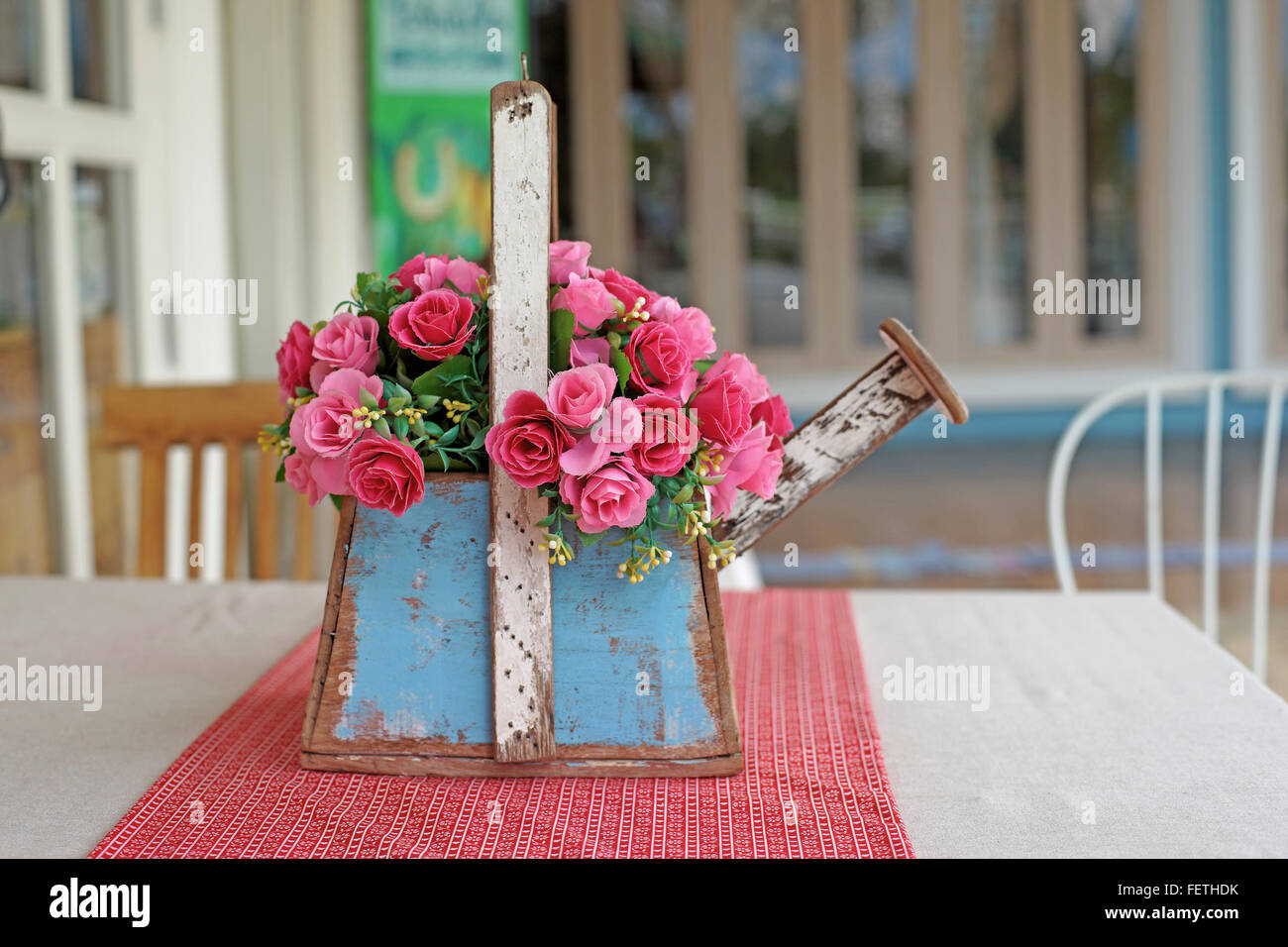 colorful of rose artificial flower in flowerpot Stock Photo