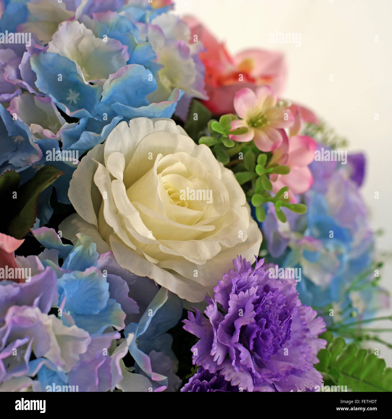 closeup of colorful rose artificial flower Stock Photo