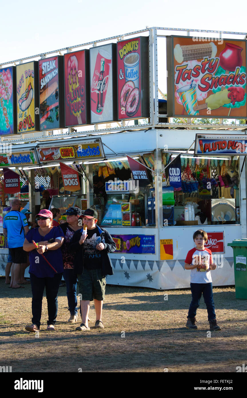 Boys enjoying snacks, Collinsville Rodeo, Queensland, Australia Stock ...