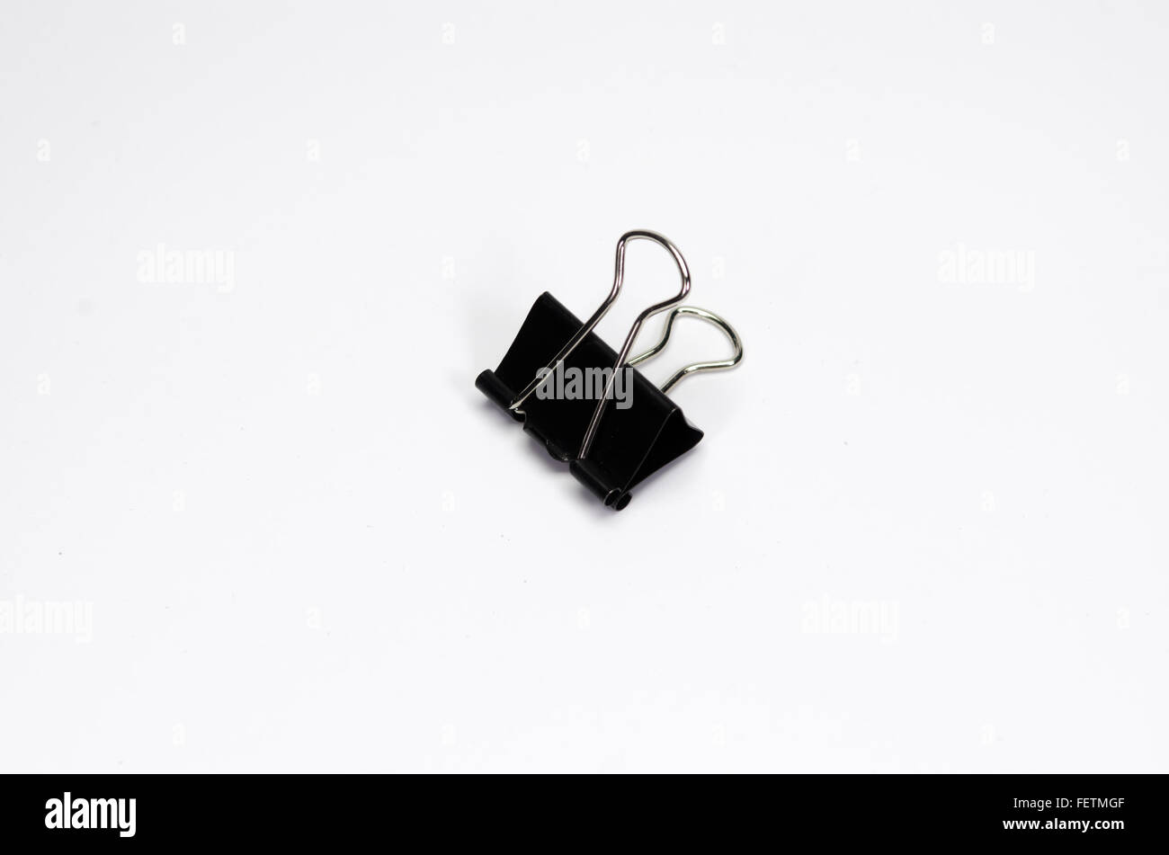 Black paper clip isolated on white background Stock Photo Alamy