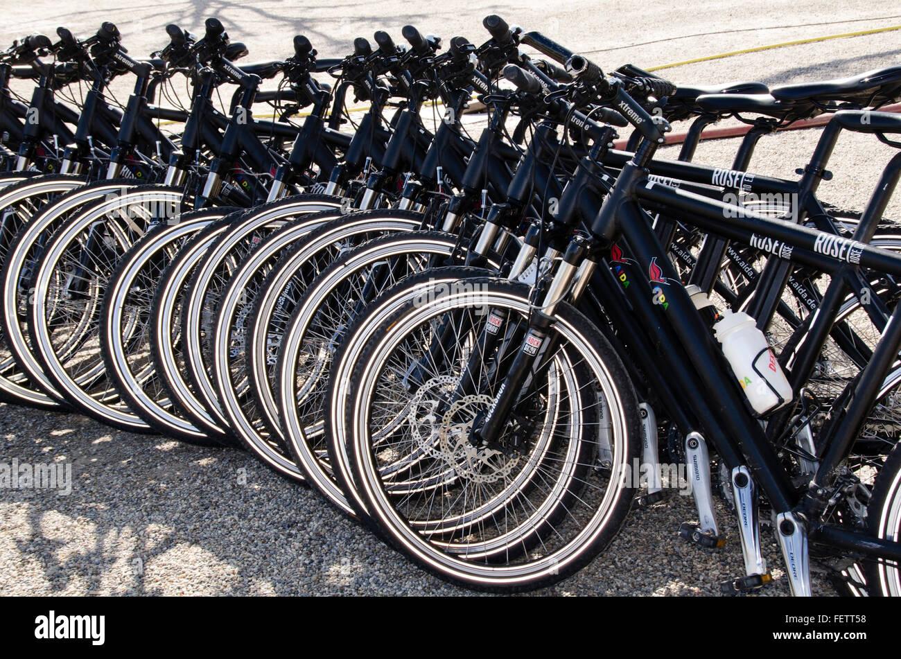 any bicycles side by side in the park Museumplein, Amsterdam Netherlands Stock Photo