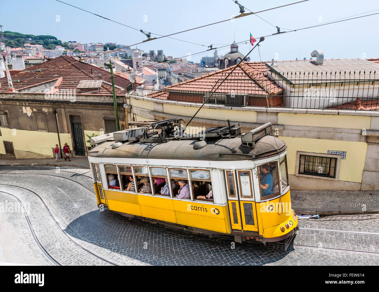 Lisbon tramway electrico 28 climbs up Calcada Sao Francisco in the Chiado neighborhood of Lisbon, Portugal Stock Photo