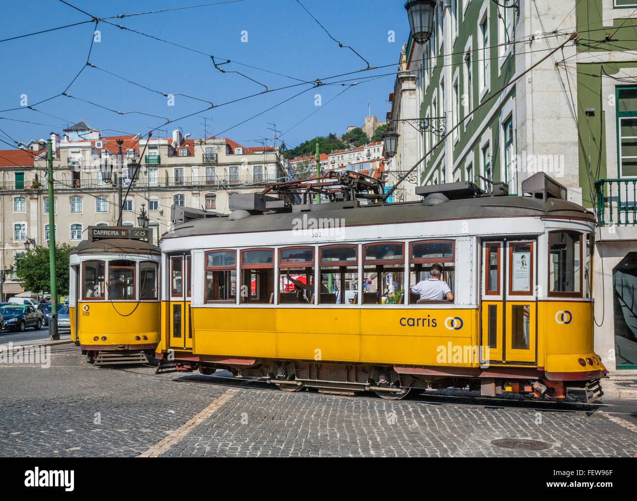 Portugal, Lisbon, Rossio, electric trams at Praca de Figueira Stock Photo