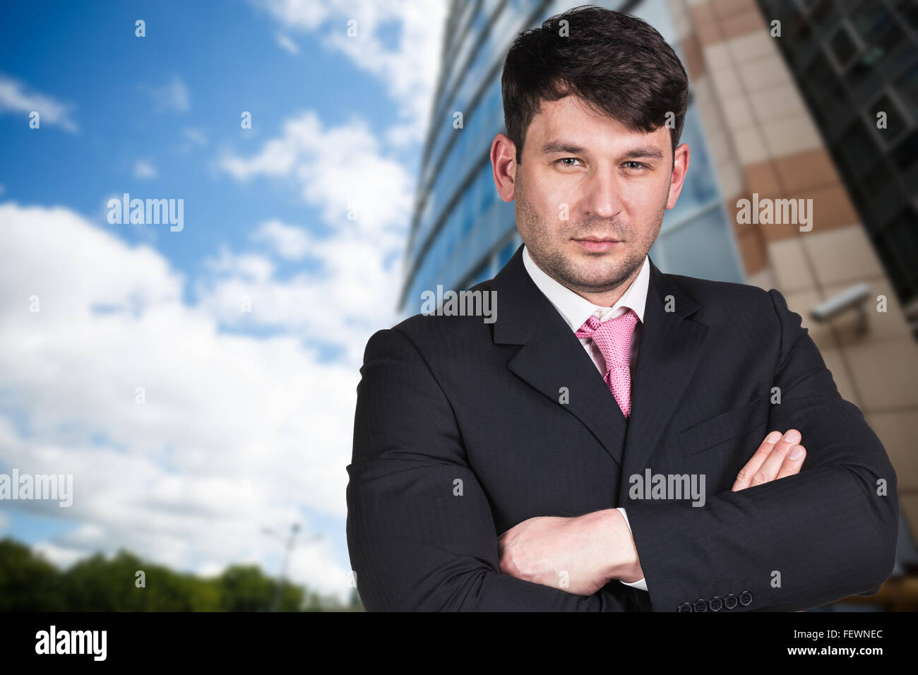 Portrait of handsome young businessman Stock Photo - Alamy