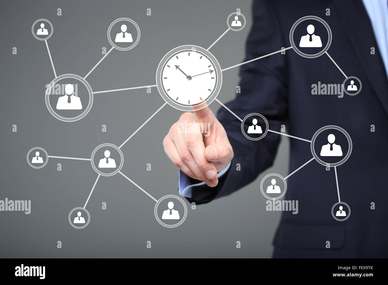 Businessman hand press clock time button icon. business, technology and internet concept Stock Photo