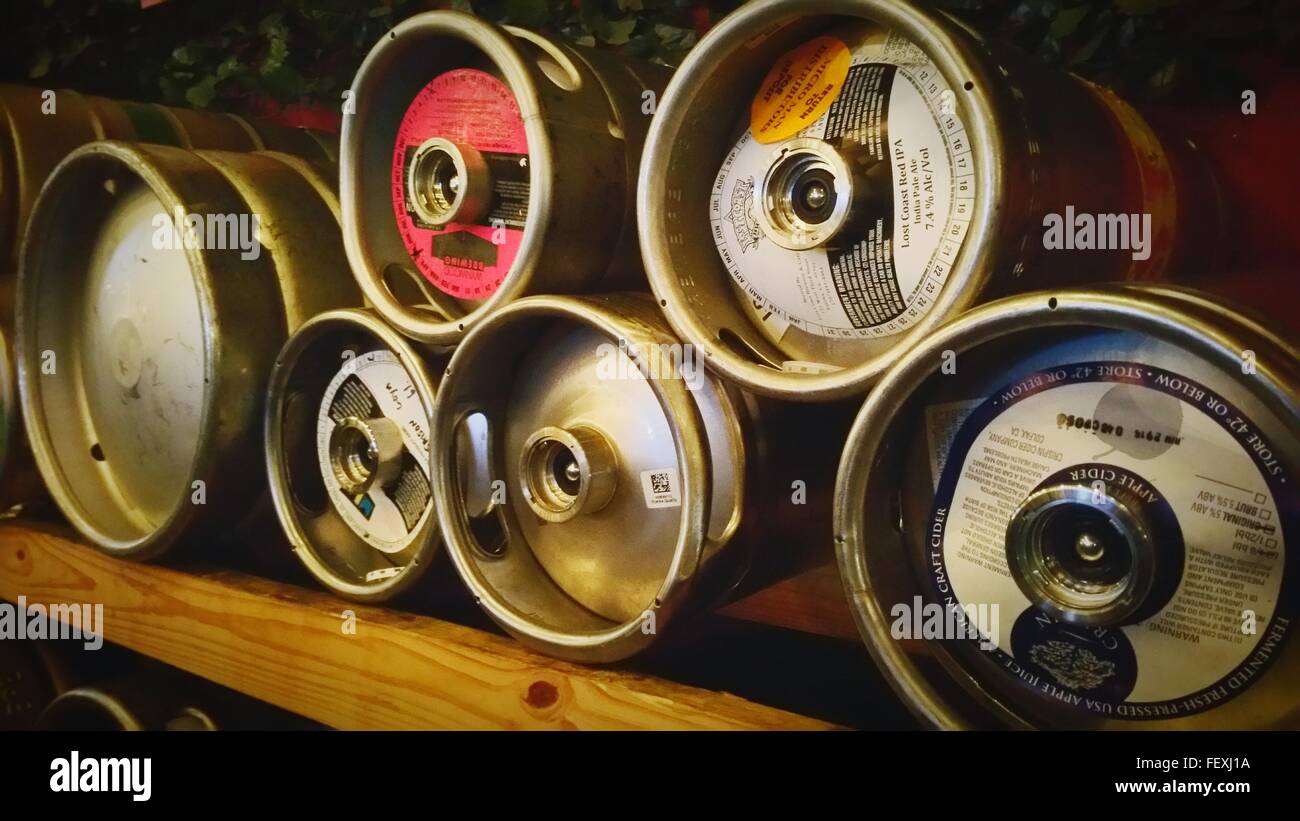 Close-Up Of Beer Kegs In Shelf Stock Photo
