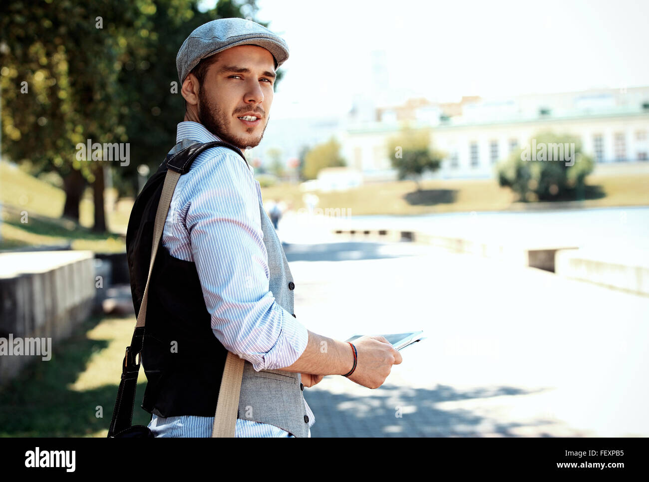 portrait of a trendy young man in the city Stock Photo - Alamy