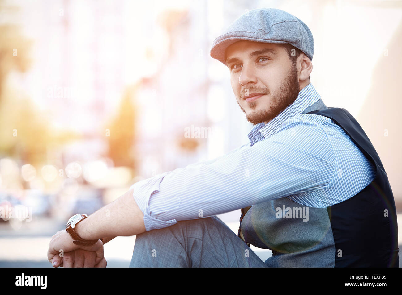 portrait of a trendy young man in the city Stock Photo - Alamy