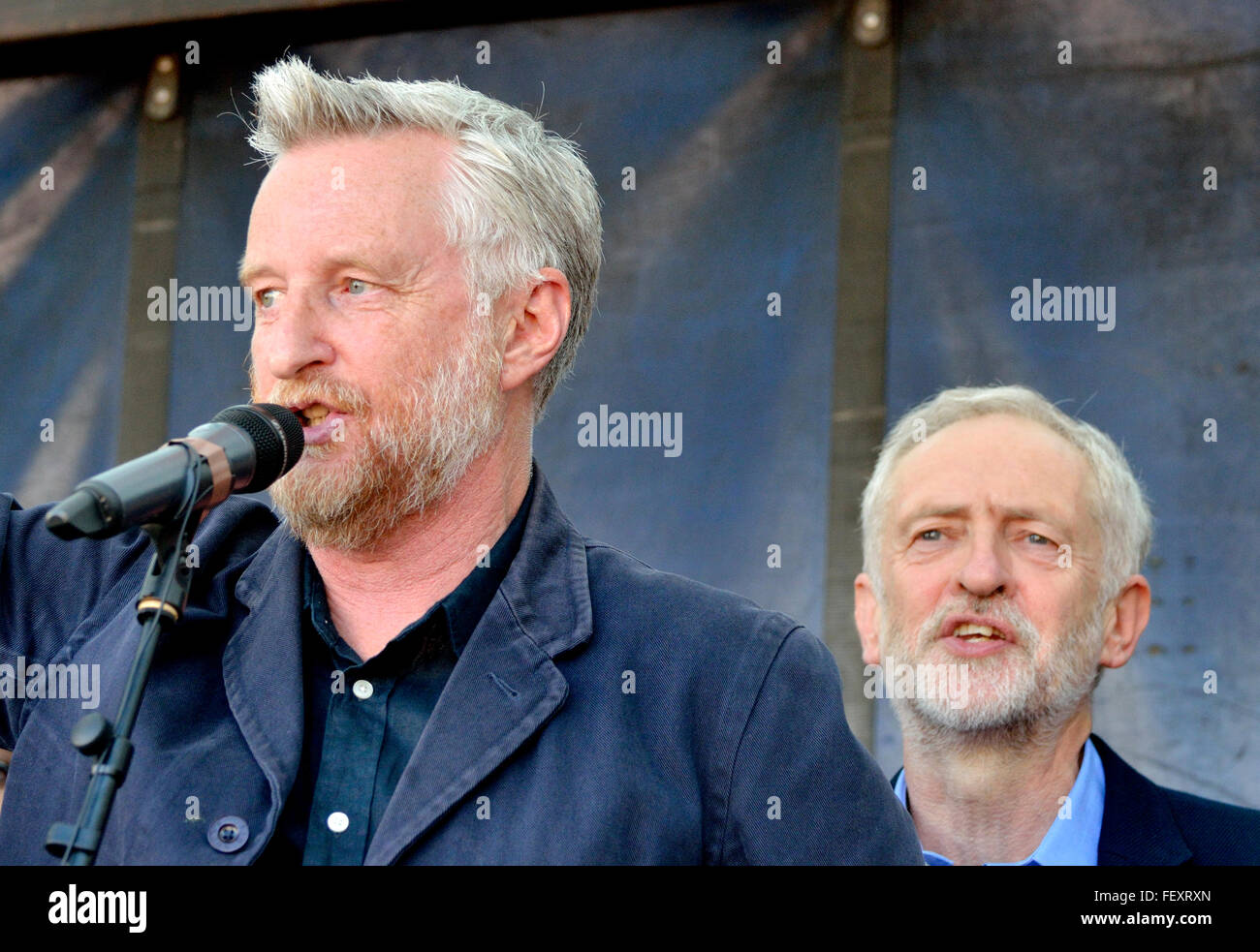 Billy Bragg and Jeremy Corbyn singing The Red Flag - 'Refugees Welcome Here' rally, Parliament Square, London 12th Sept 2015... Stock Photo