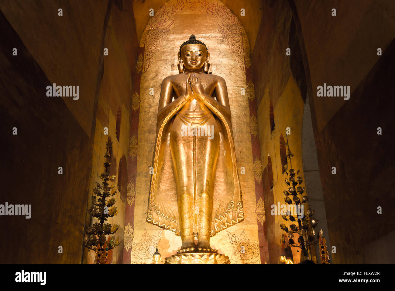 Buddha image inside Ananda temple, Bagan, Myanmar. Stock Photo