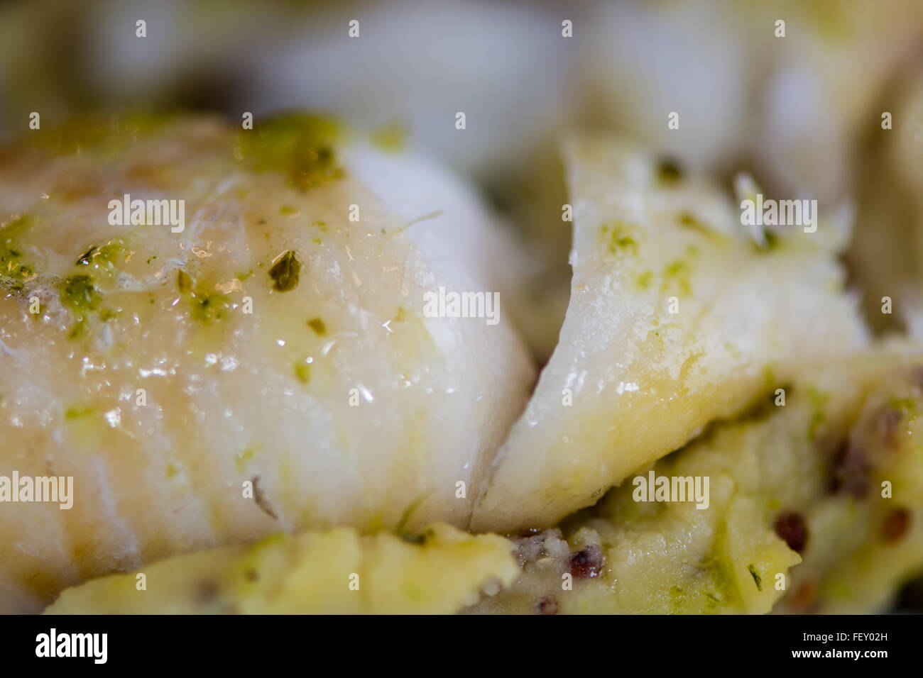 Haddock with whole grain mash and garlic parsley butter. French
