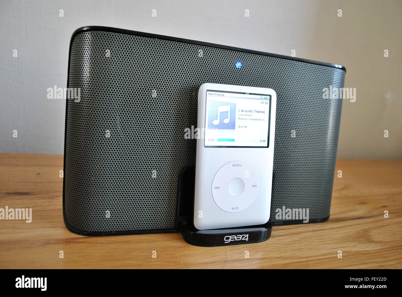 silver Apple ipod classic in a docking station Stock Photo - Alamy