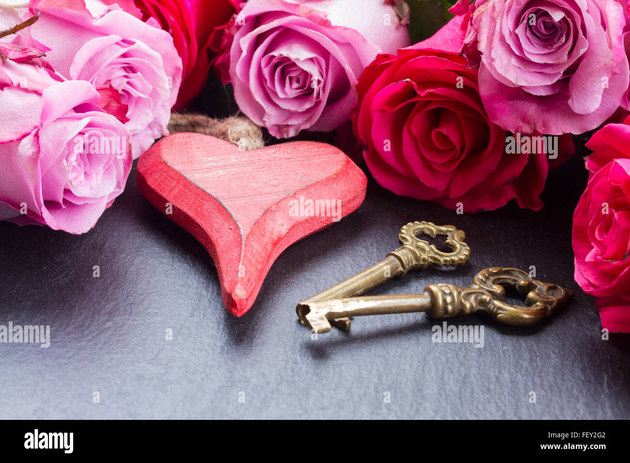 Heart keys on color hi-res stock photography and images - Alamy