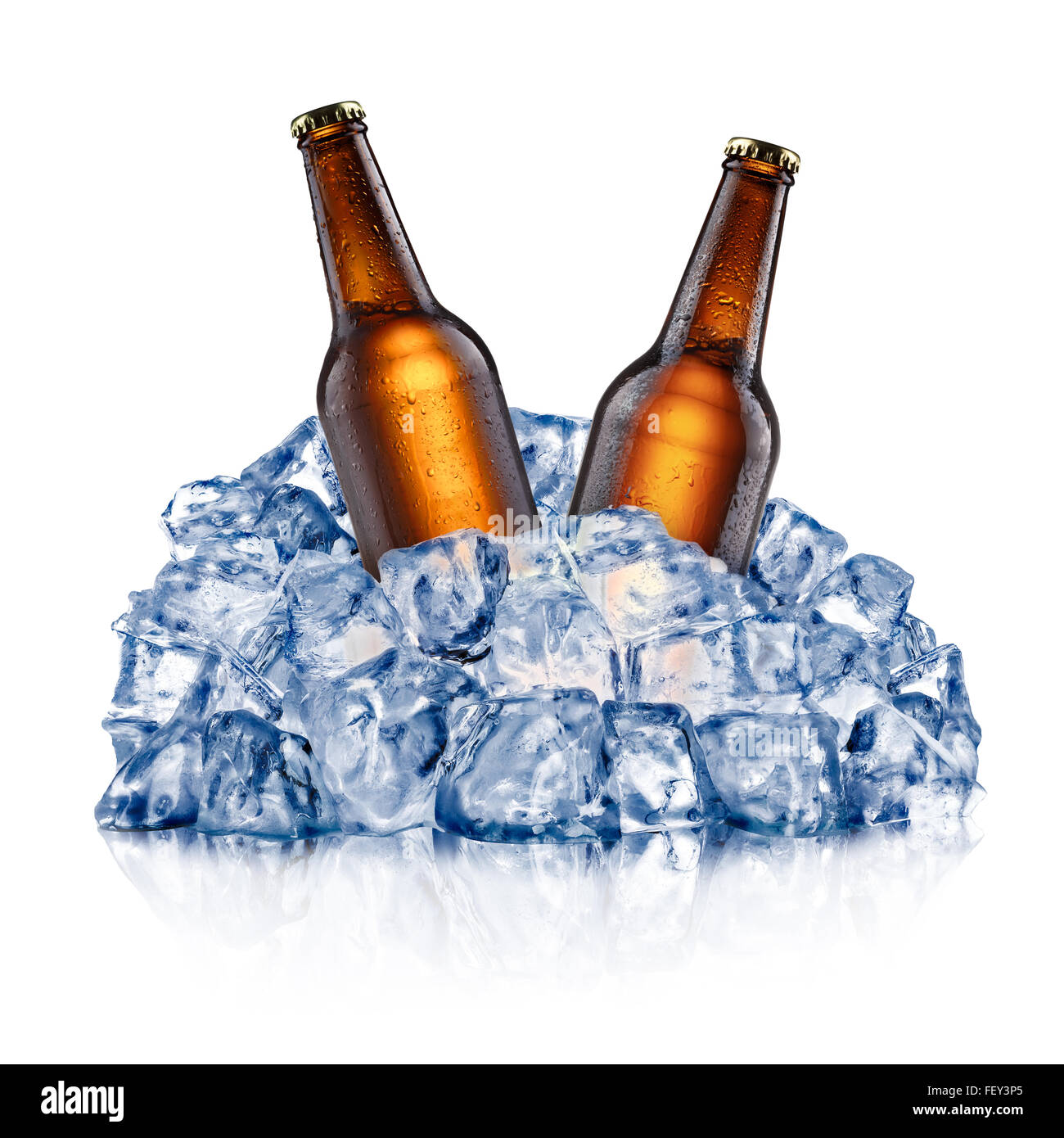Two brown beer bottles, cooling down in a rough crushed ice. Clipping paths Stock Photo