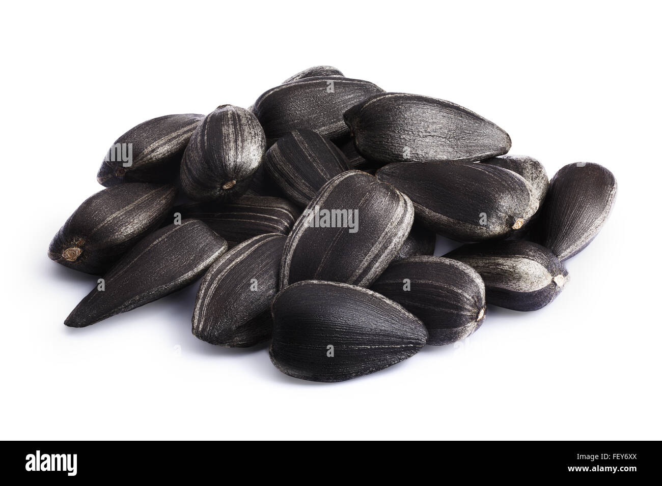Edible sunflower seeds, roasted. Infinte depth of field, clipping paths Stock Photo