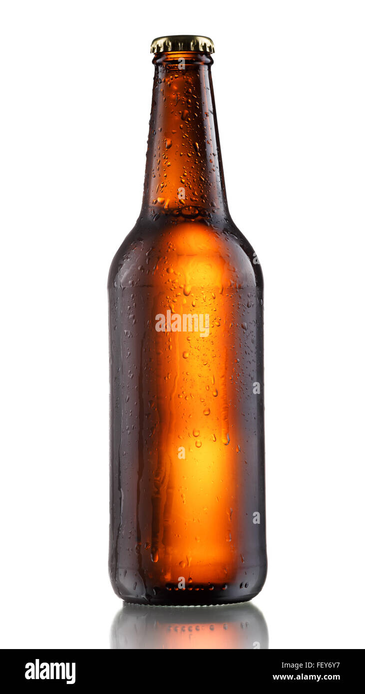 Full, sealed brown bottle of dark beer with drops. Matt appearance