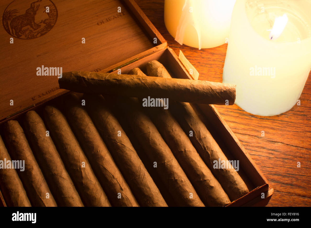 Cigars by candlelight. A box of fine De Olifant cigars from Kampen, Holland ( the Netherlands ) Stock Photo