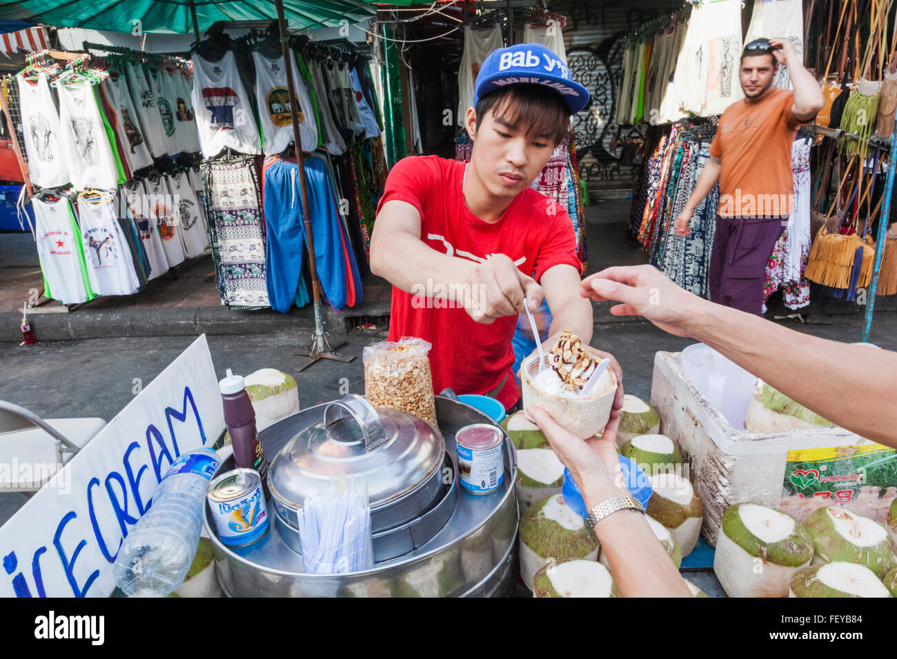 Thailand, Bangkok, Khaosan Road, Coconut Icecream Vendor Stock Photo