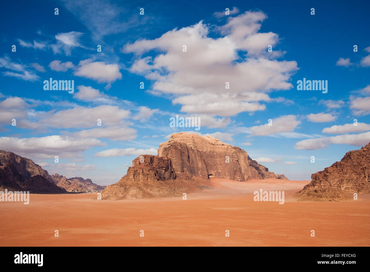 Red sand and beautiful mountains in Wadi Rum desert reservation, Jordan. Copy space Stock Photo
