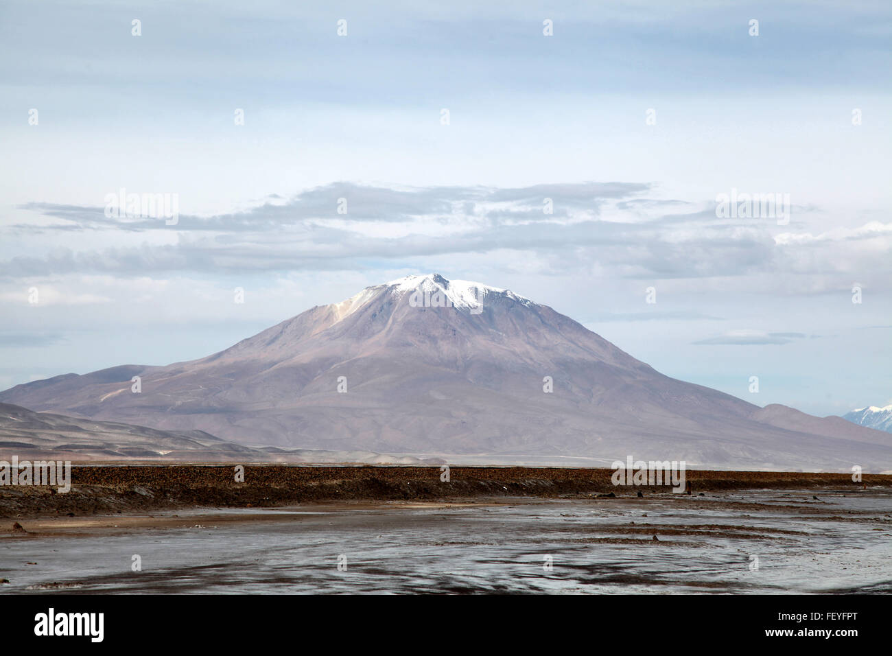 Salt Flats With Mountain In Background Stock Photo - Alamy