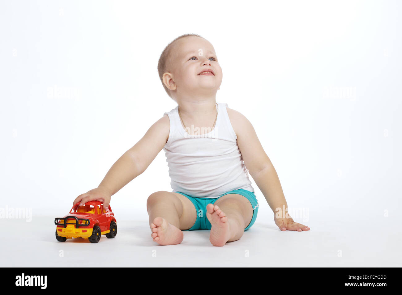 little boy plays with toy car Stock Photo - Alamy