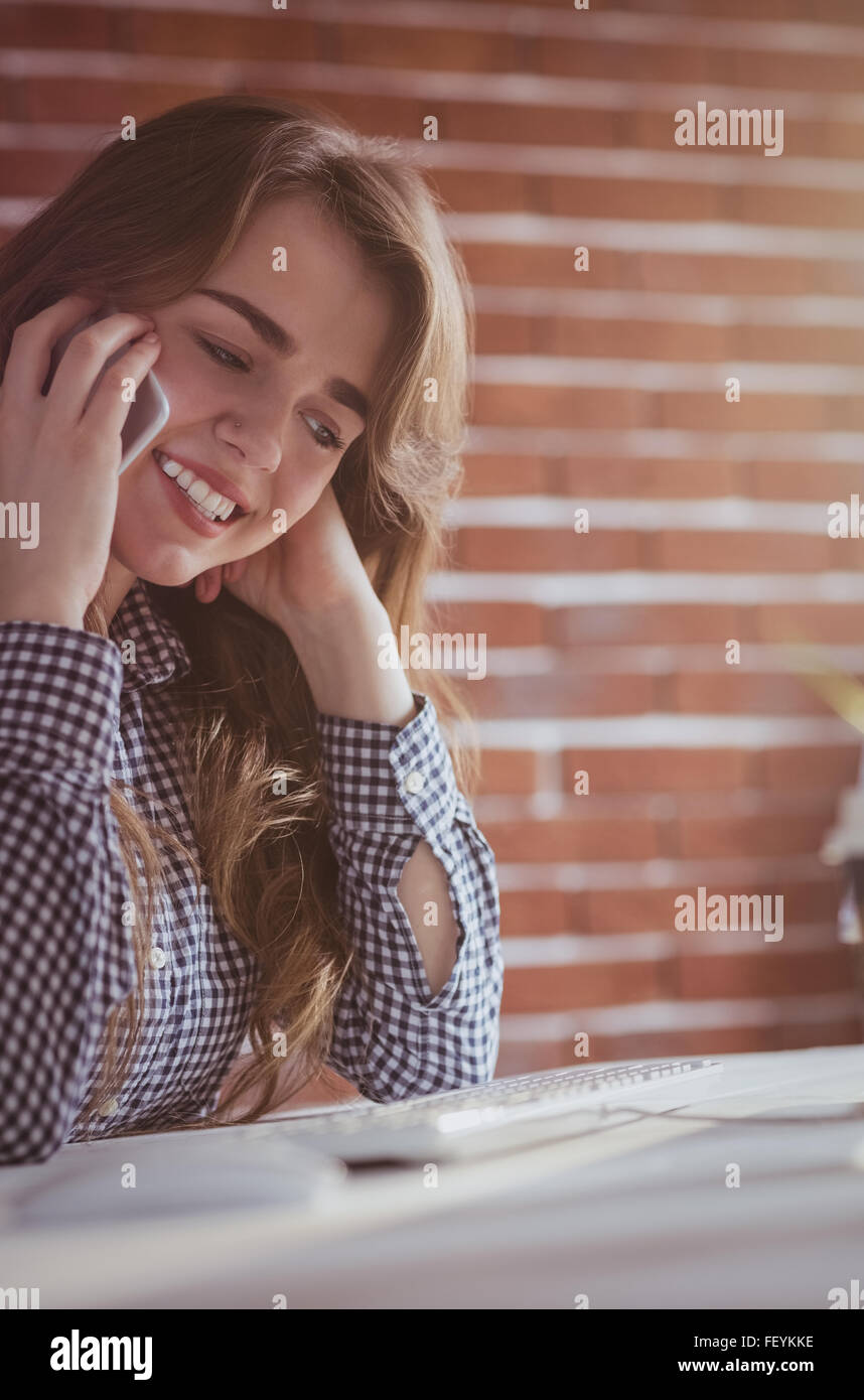 Young hipster businesswoman calling with her phone Stock Photo