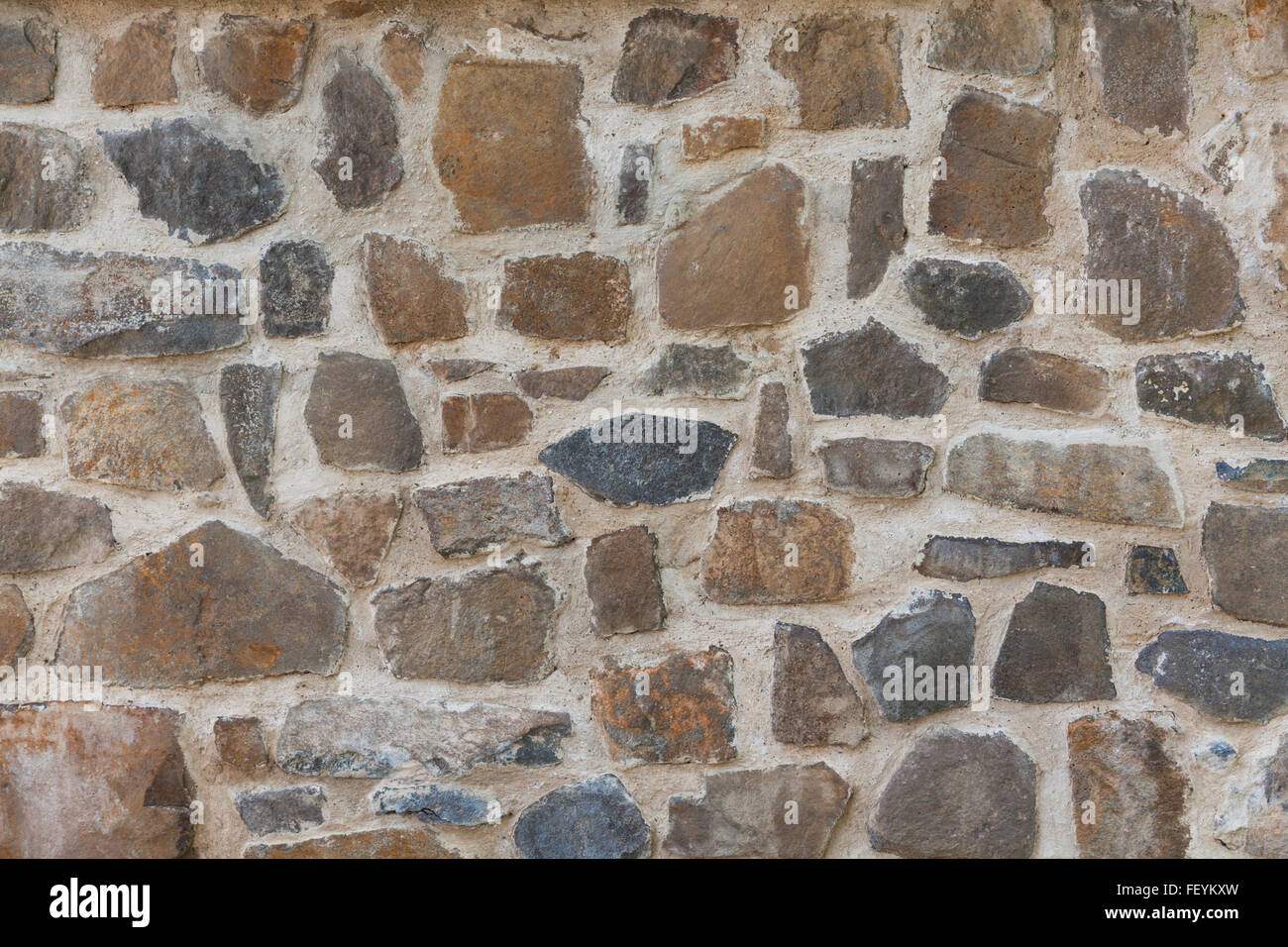 Stone (basalt) wall - background texture Stock Photo - Alamy