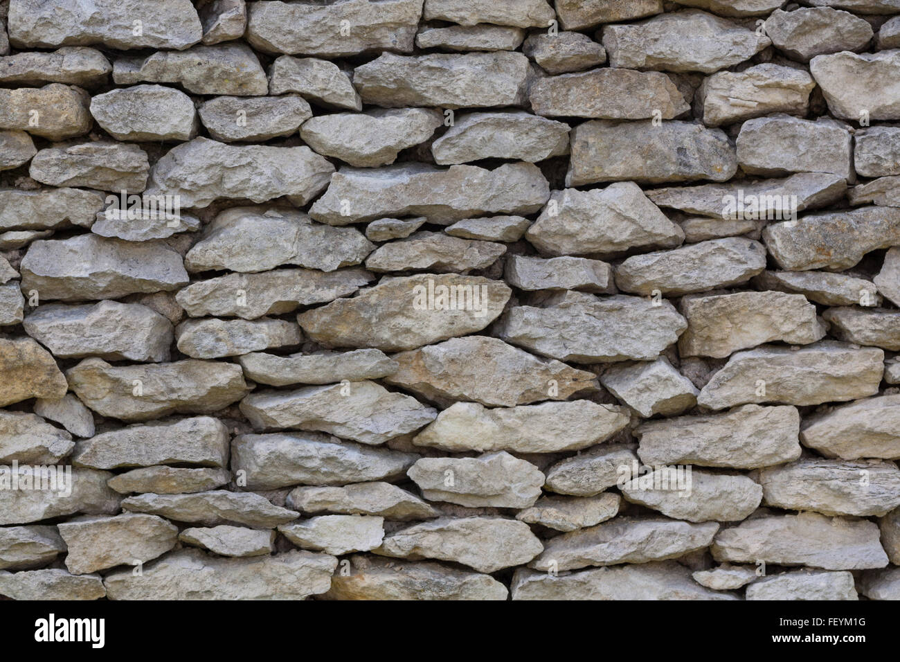 Stone wall - background texture Stock Photo - Alamy