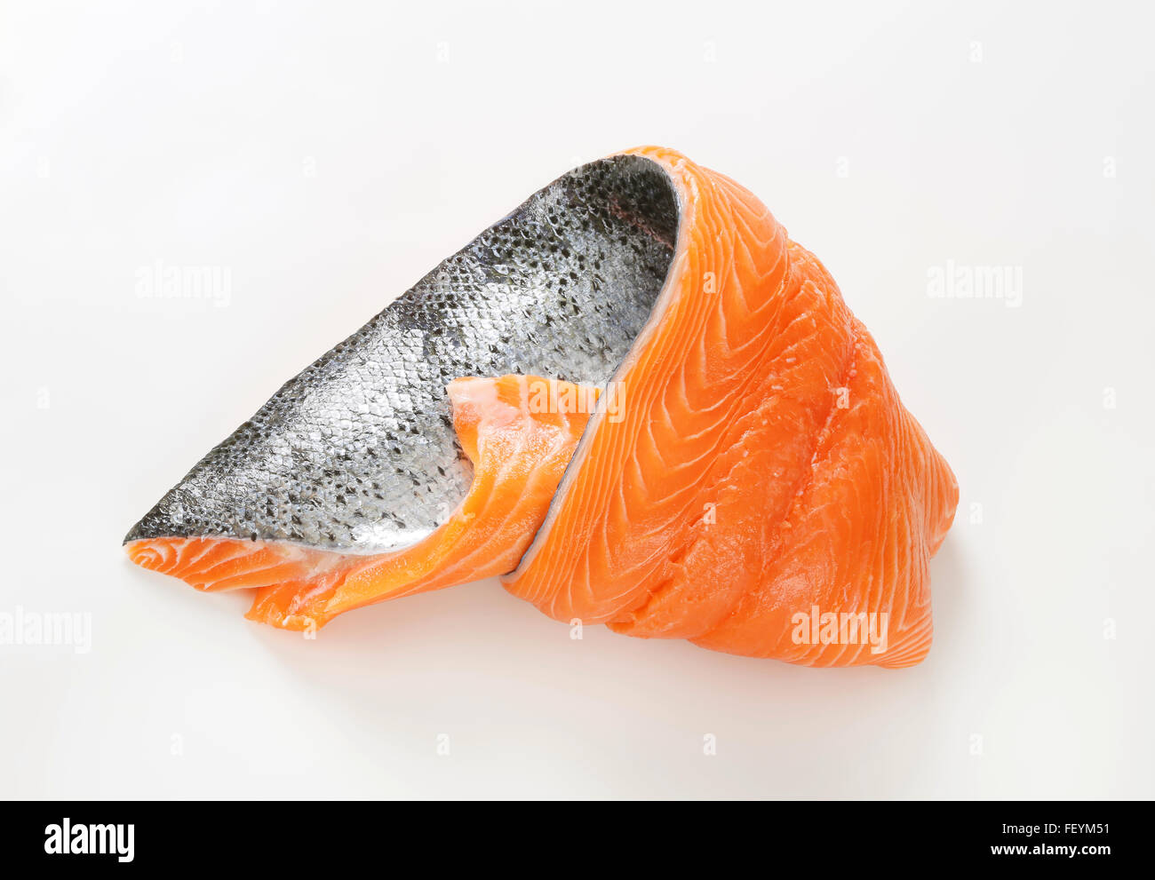 raw salmon fillet with silver skin on white background Stock Photo - Alamy