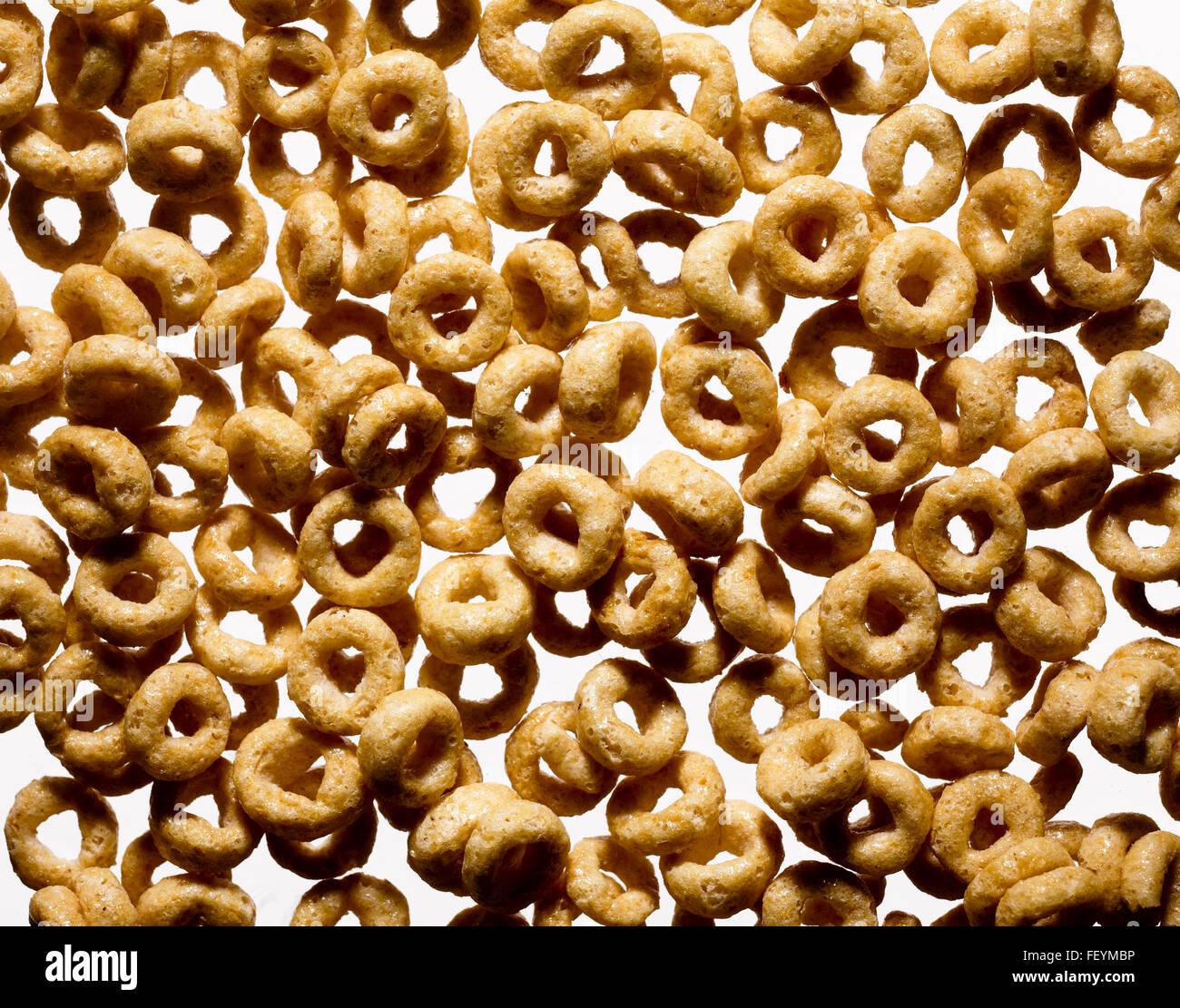 Circle shaped cereal pieces on white background Stock Photo