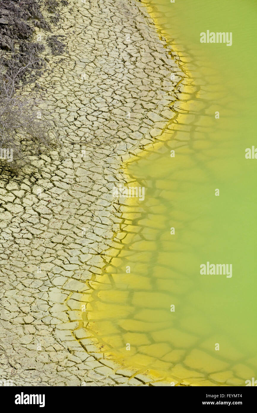 Sulfur Lake Shore - Yellow water and cracked shore Stock Photo - Alamy