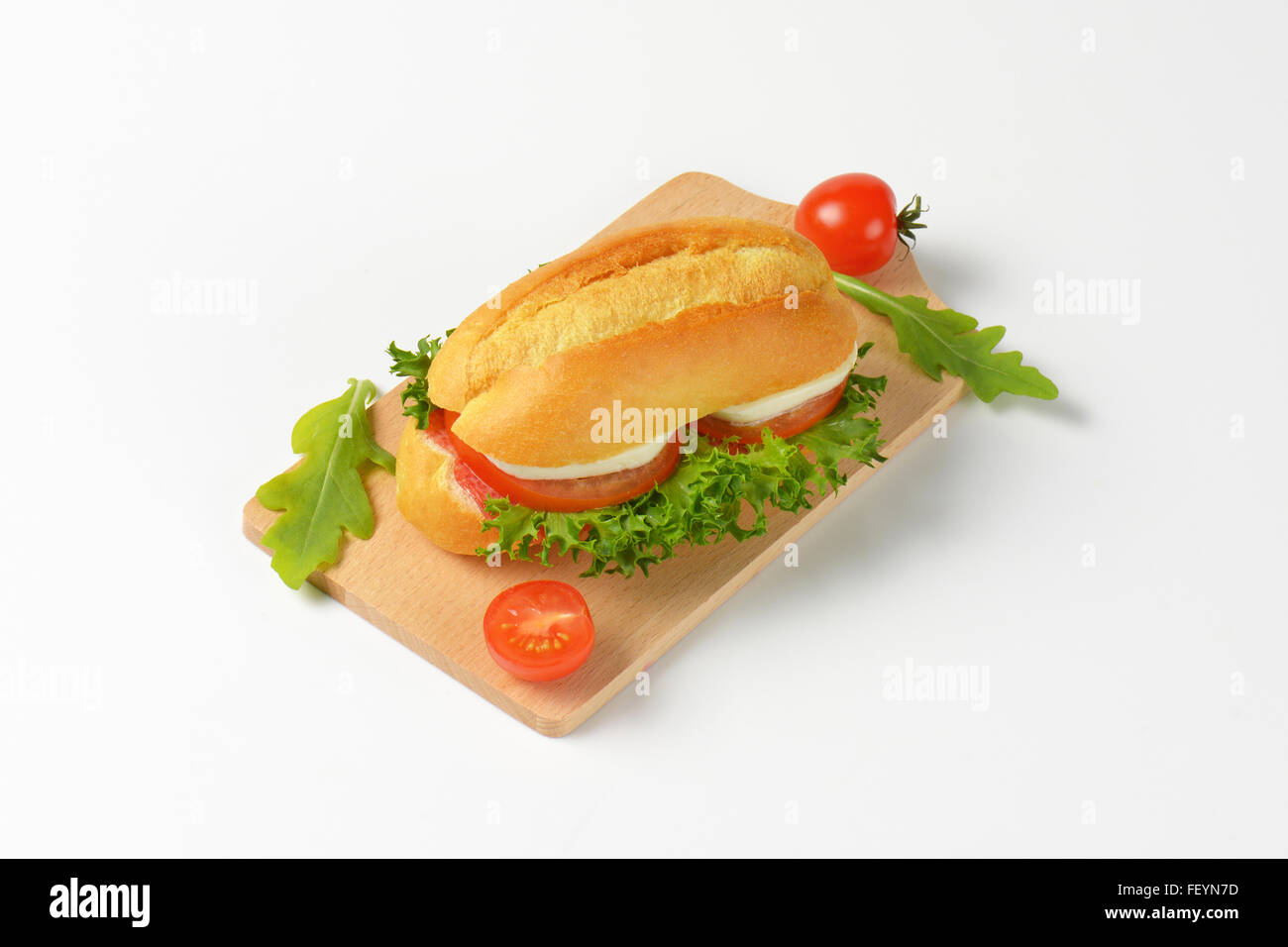 bun sandwich with mozzarella cheese, tomato and lettuce Stock Photo Alamy